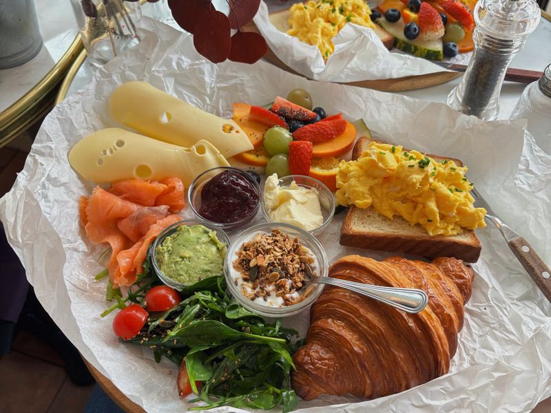 The Big Brekky platter with eggs, salmon, croissant and fresh sides